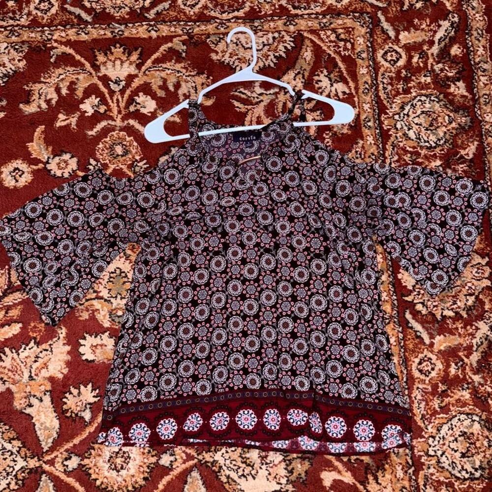 Corvia patterned bell sleeve blouse
